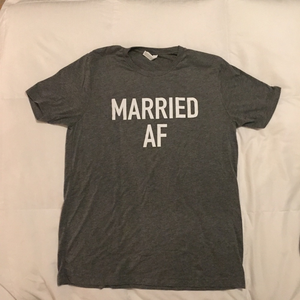 His and hers matching “married AF” shirts